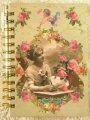 ミハエル・ネグリン　ノート(S)　横綴　女性とバラ	　12.6*9.6*1.8cm　ゴールドカラーのボールペンが付いています。＜天使と薔薇の雑貨＞